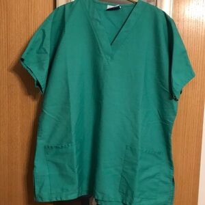 Basic teal scrubs top from Dilly Uniform by Encompass. Size XL. V neck 2 pockets